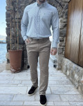 Ανδρικό μονόχρωμο, υφασμάτινο παντελόνι με Chinos τσέπες.