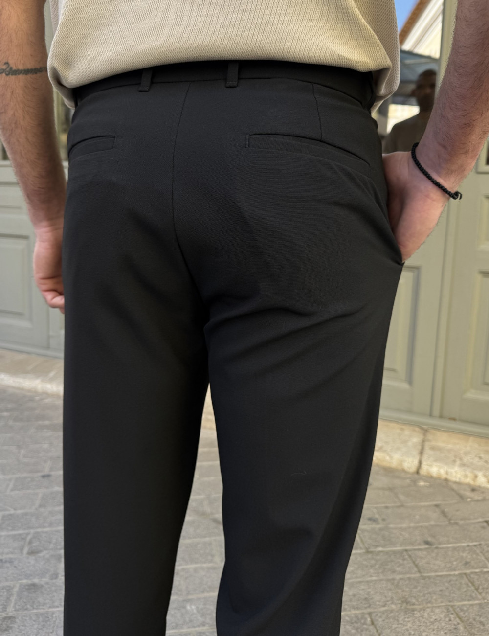 Ανδρικό υφασμάτινο παντελόνι με πιέτες.