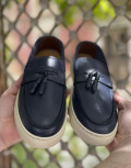 Ανδρικά δερμάτινα loafers με tassels.
