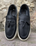 Ανδρικά δερμάτινα loafers με tassels.