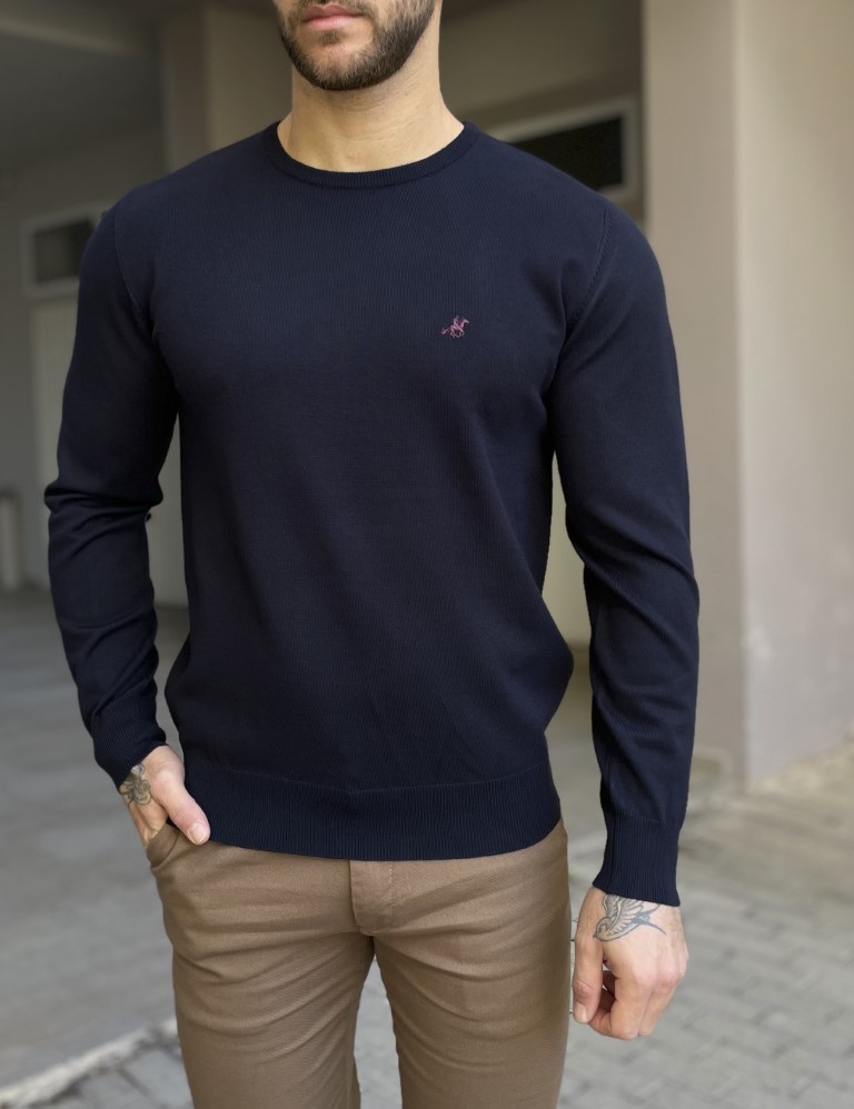 Ανδρικήμπλούζα μελεπτή πλέξηκαιστρογγυλήλαιμόκοψη. Διαθέτει λάστιχο στα τελειώματαΚανονική εφαρμογήΣύθεση: 80% visc, 20% nyl,Το μοντέλο έχει ύψος 1,85 και 85 κιλά. Φοράει 2XL