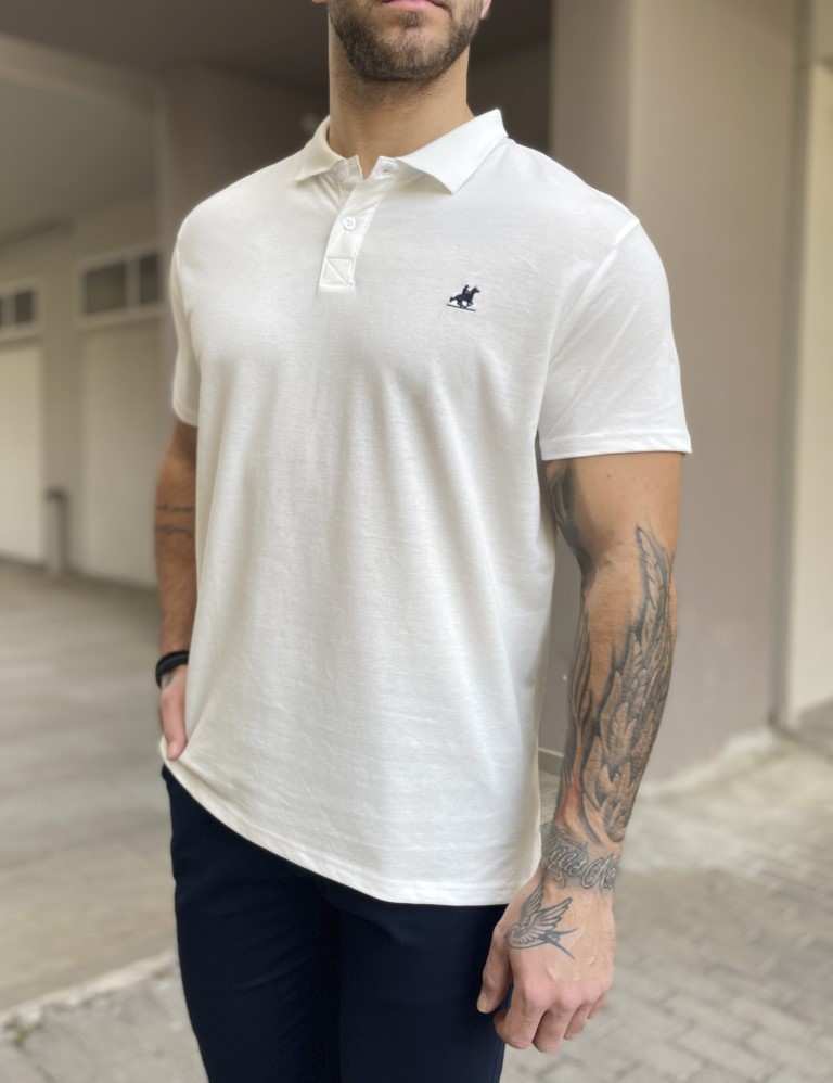 US Grand Polo Ανδρικήπόλοκοντομάνικημπλούζαπικέ. Διαθέτει κουμπιά στον γιακά. Έχει μικρό διακριτικό κέντημα στο στήθος με το λογότυπο.Κανονική εφαρμογή με λίγη ελαστικότηταΣύνθεση: 100% βαμβάκιΤο μοντέλο έχει ύψος 1.85 και 95 κιλά. Φοράει μέγεθος XL